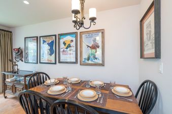 The dining area in Telluride Lodge 308 offers a cozy and inviting space for meals.