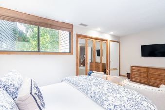 The primary bedroom in Telluride Lodge 532 is bright and inviting.