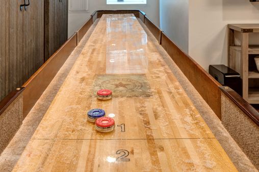 Games Room with Shuffle Board Table