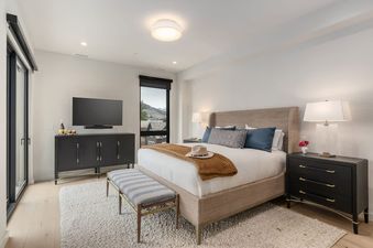 Elegant master bedroom at Sky View Jackson Hole with a king-size bed and modern decor.