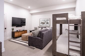 Moonlight Basin 16 Wildwood includes a bunk bed in the living room, perfect for kids and families.