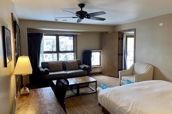 A cozy bedroom at Peaks Penthouse 643 offers a relaxing retreat.