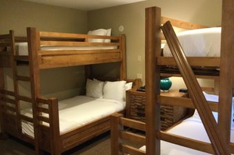 Manor Vail 254 features two sets of bunk beds in a bedroom.