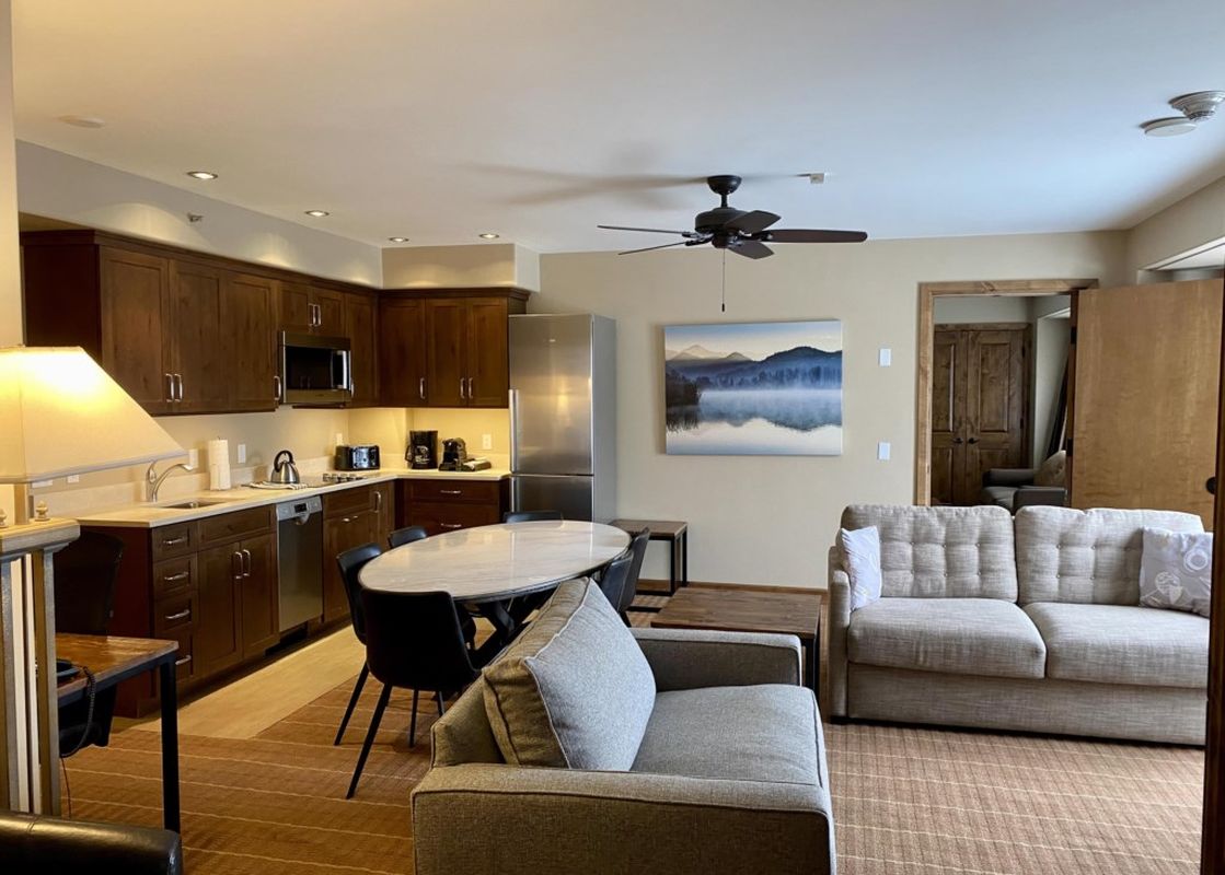 Living area and kitchen in Peaks Penthouse 643.