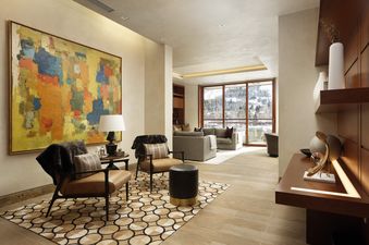 The Mother Lode living room showcasing art and comfortable seating.