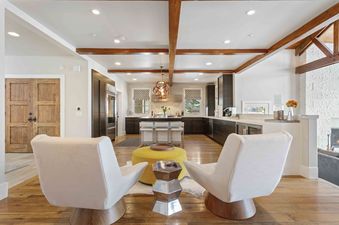 Stylish living area at 6977 Silver Lake Drive with comfortable seating and open-concept kitchen.