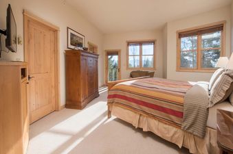 The cozy master bedroom of Moose Creek 33.