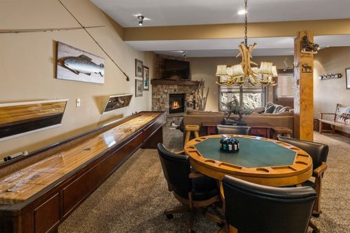 Games Room with Shuffle Board and Card Table