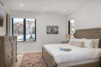 Bedroom at Spotted Saddle Lodge with a comfortable bed.