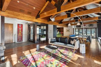 The living area of Town Lift Haven is spacious and stylish.