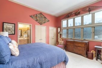 The master bedroom at Shirana 7 boasts stylish decor and plenty of natural light.
