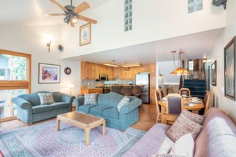 The inviting living area of Telluride Lodge 411 offers a comfortable space to relax and enjoy.