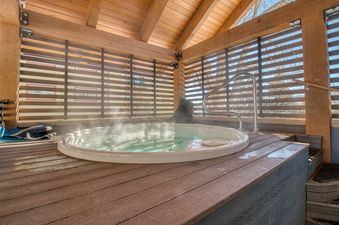 Shadow Run E303 features a private hot tub for ultimate relaxation.