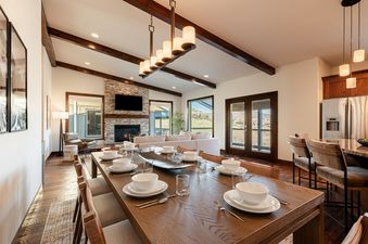 Modern open-concept dining and living area at Mayflower Vista.