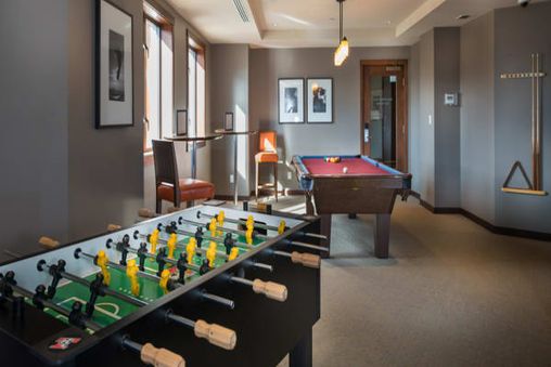 Games Room with Foosball and Pool Tables
