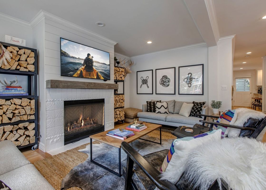The living room at Abode at Watson House provides a comfortable place to relax and unwind.