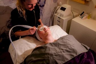 A guest receiving a spa facial treatment at Manor Vail Lodge Platinum 3 Bedroom Condo.