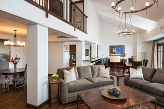 Dining room, living room and kitchen in four bedroom Penthouse Residence