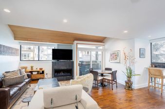 Living and dining area in Telluride Lodge 323.