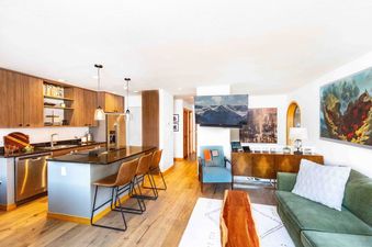 The living space at Lulu City 5D provides an open floor plan and updated appliances.