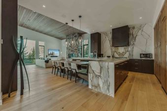 The open-concept living area at The Frostline in West Vail showcases modern design and inviting comfort.
