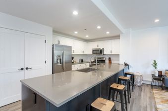 The kitchen in Bear Creek Lodge 207 features modern appliances and ample counter space.