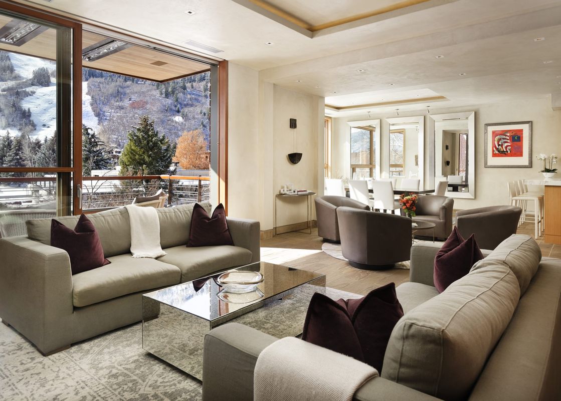 A luxurious living room at The Mother Lode with stunning mountain views.