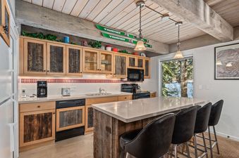 Rustic kitchen at Chateau Eau Claire Unit 1.