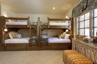 Chalet 67 features a bedroom with a bunk bed.