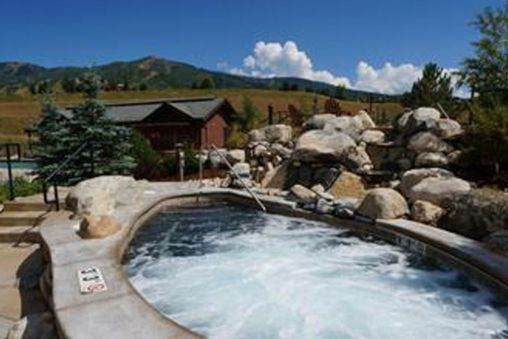 Three grotto-style hot tubs
