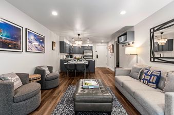 Modern open-concept living and dining area in Snow Flower 137.