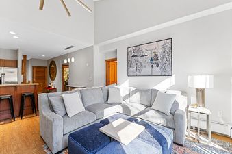 The spacious living room at Red Hawk Townhome 2349 offers a cozy retreat with modern amenities.