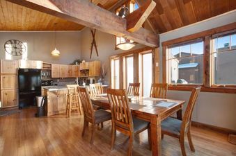 The dining area and kitchen of 701B Quail townhome.