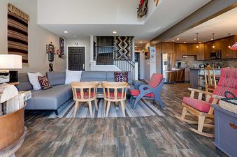 An upside-down interior view of Ranch at Steamboat RA220's living space and kitchen, featuring creative decor and modern amenities.