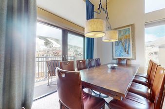 Dining area at Vantage Point 401 with seating for eight.