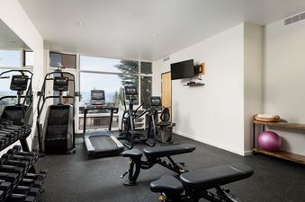 A well-equipped fitness center at Timberline Two Bedroom B2E with cardio machines and weights.