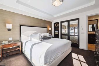 The Lodge Tower 687 2 Bedroom features a well-appointed bedroom.
