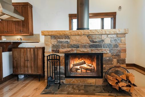 Large Stone Woodburning Fireplace