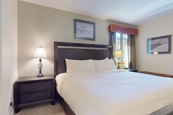 The well-appointed bedroom in Enzian 116 features a comfortable king-sized bed.