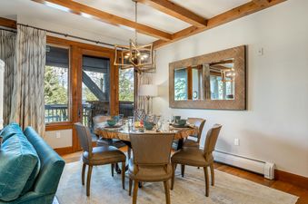 The elegantly set dining table in 304C Bear Paw Lodge.