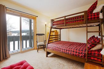Bunk beds in bedroom of Silverado I Building B Unit 204.