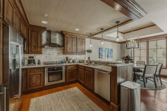 The Eagles Nest at the Ritz-Carlton kitchen offers stainless steel appliances and beautiful cabinetry.