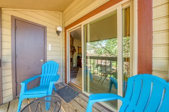 The relaxing patio at Shadow Run E303 is furnished for enjoying the outdoors.