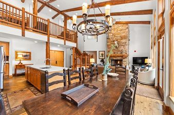 Dining area in Timbers 3082 featuring a wooden dining table.