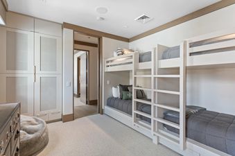 The Tower Club 6 features cozy bedroom with bunk beds, perfect for family or group stays.