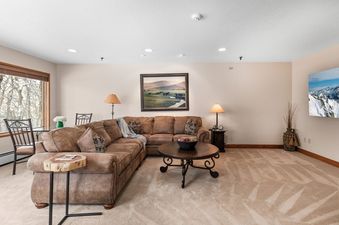 A well-decorated living room inside Abode at Highpoint.